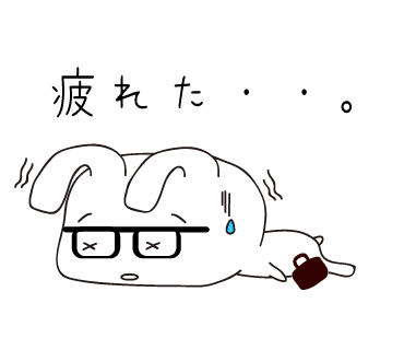 倒れている黒縁うさぎの画像